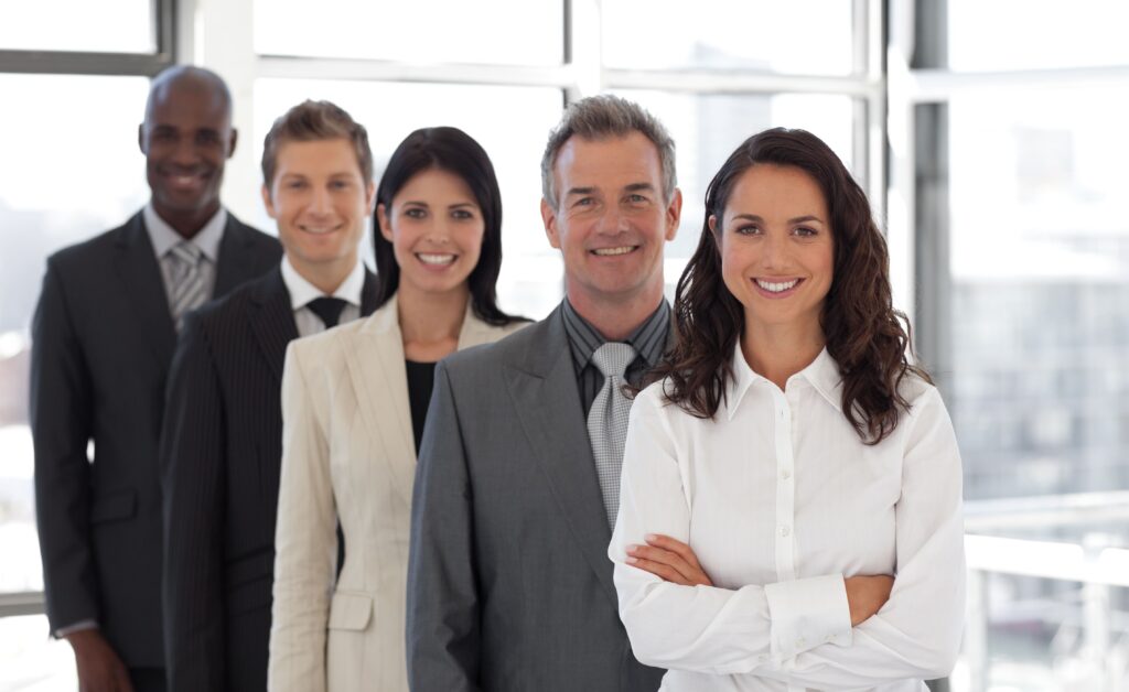 Sales team smiling together